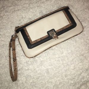 Cream and black wristlet